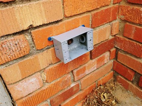 how to install an exterior junction box on brick|exterior outlet for brick house.